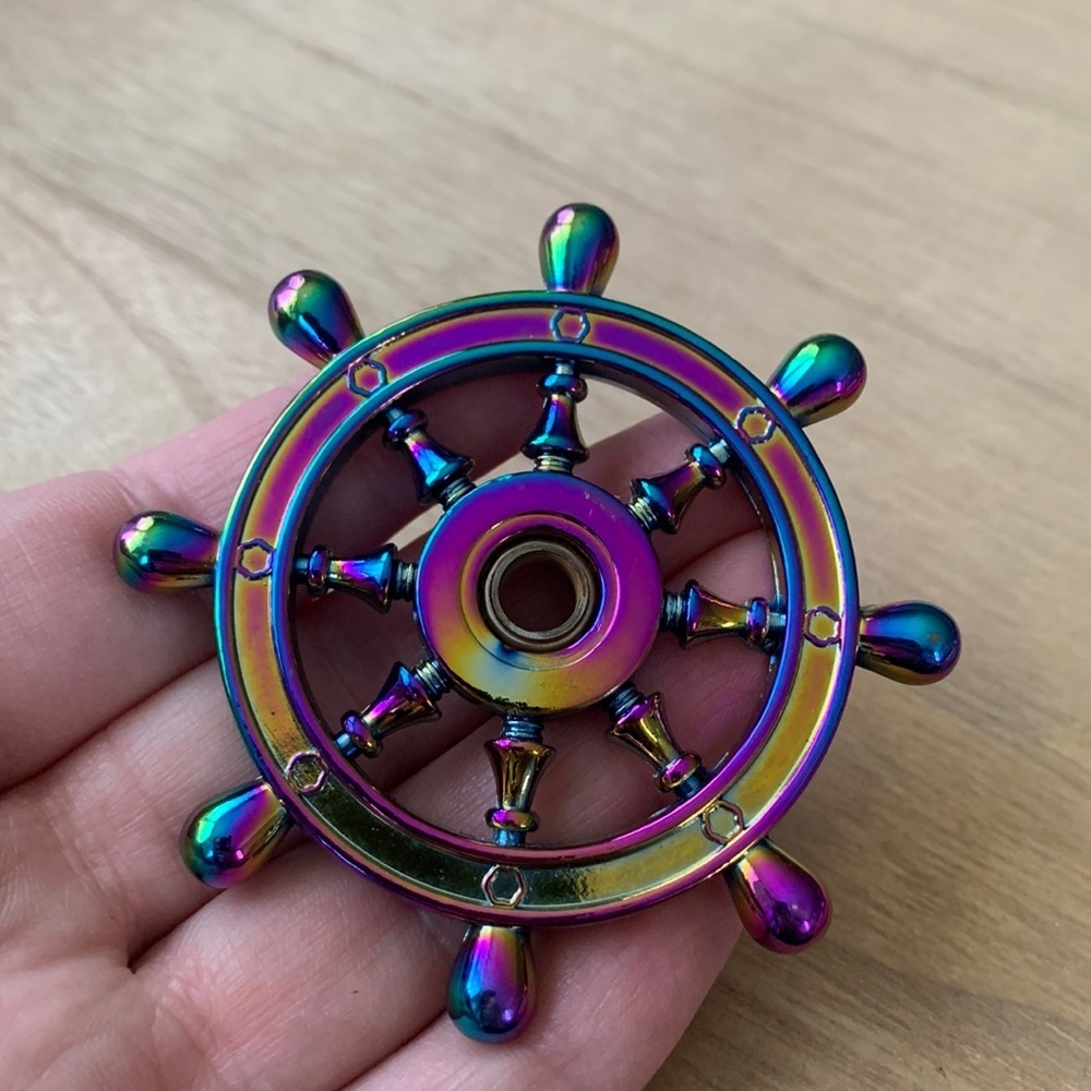 Stainless steel rainbow colored captains wheel. - Picture 3 of 3